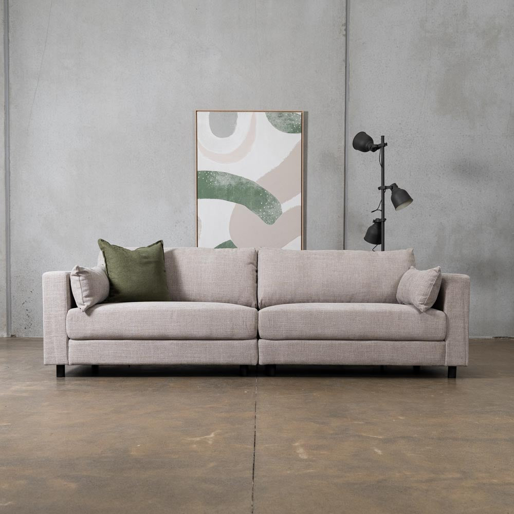 Secret Sofa Alex Fabric 4 Seat Sofa in Hastings Sand with metal legs and removable small cushions.
