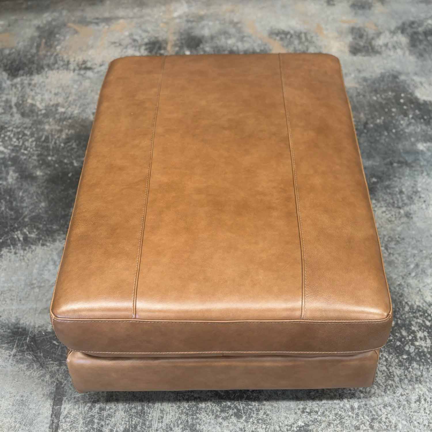 Imperfect Barcelona Leather Ottoman in Derrick Umber