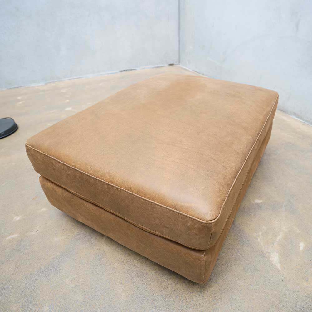 Imperfect Barcelona Leather Ottoman in Brumby Natural