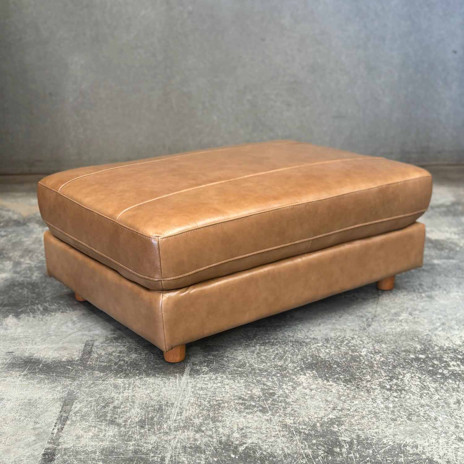 Imperfect Barcelona Leather Ottoman in Derrick Umber