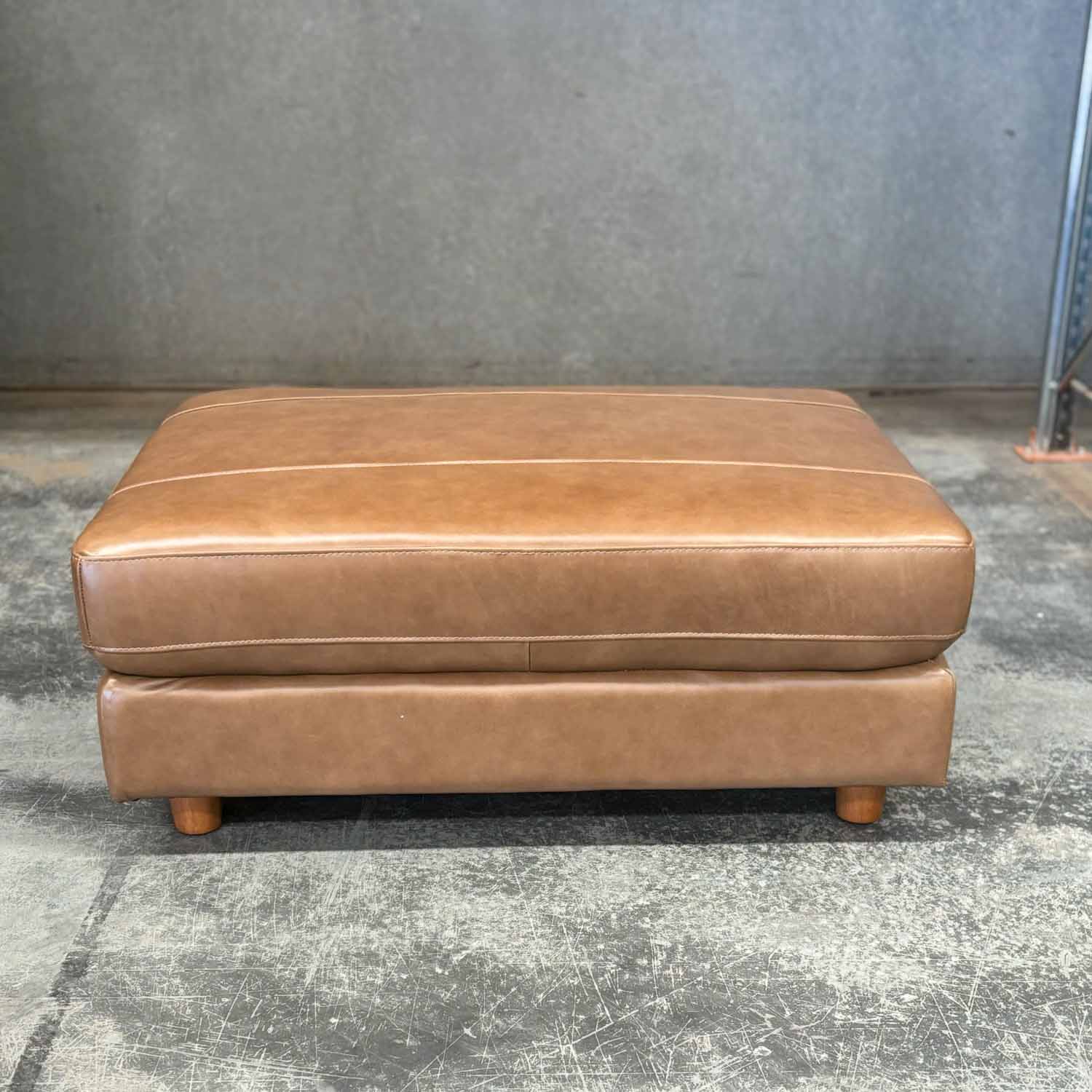 Imperfect Barcelona Leather Ottoman in Derrick Umber